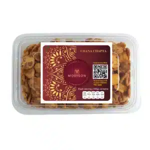 Golden brown Indian snack Chana Chaat in clear plastic container with Modison branding.