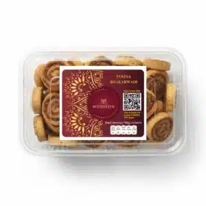 Delicious Indian sweet snack Poona Bhakarwadi in a clear plastic container, perfect for gifting or sharing.