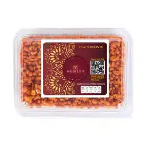 Crispy plain boondi traditional Indian snack in plastic container.